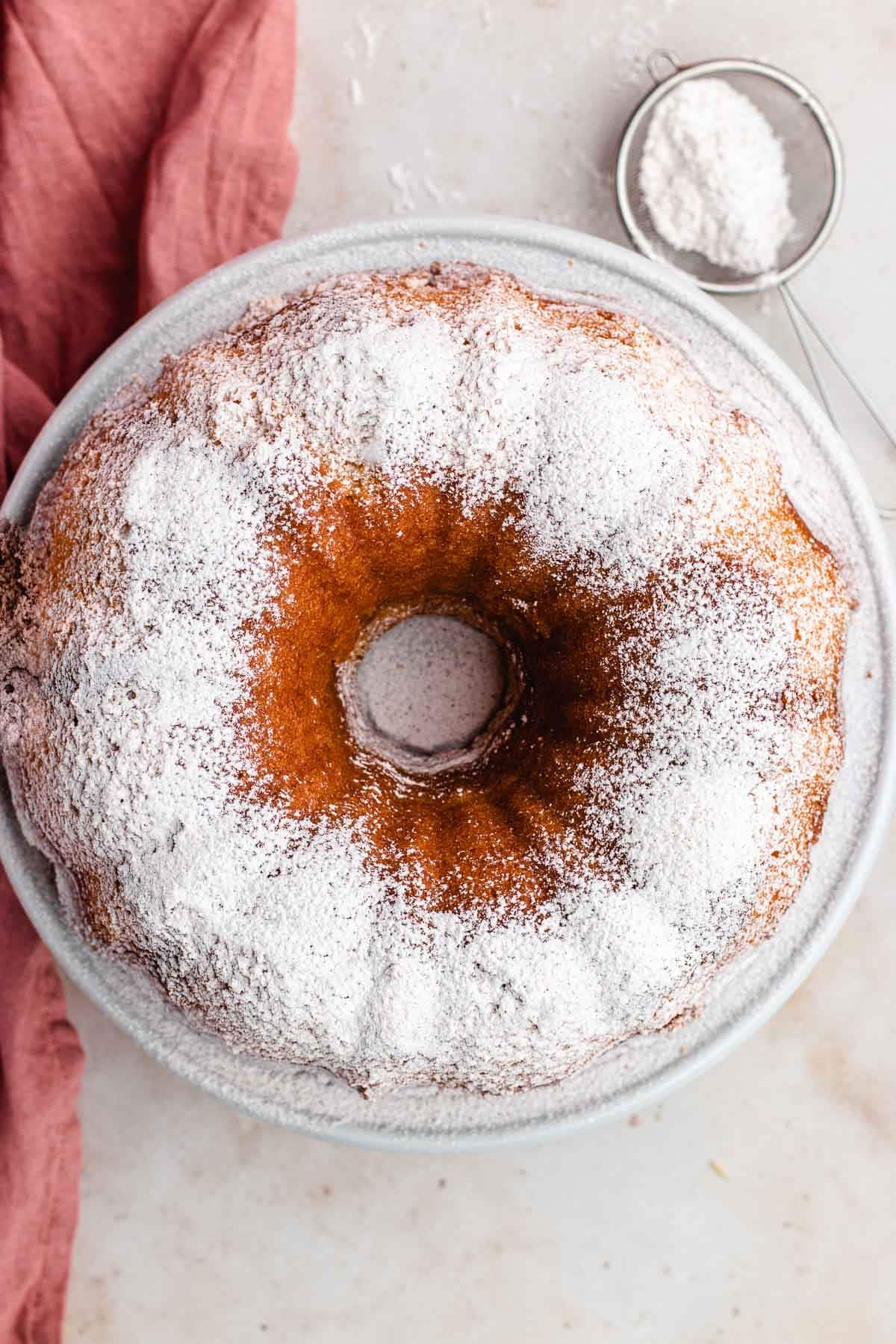 Aerial view of Sour Cream Pound Cake with powdered sugar