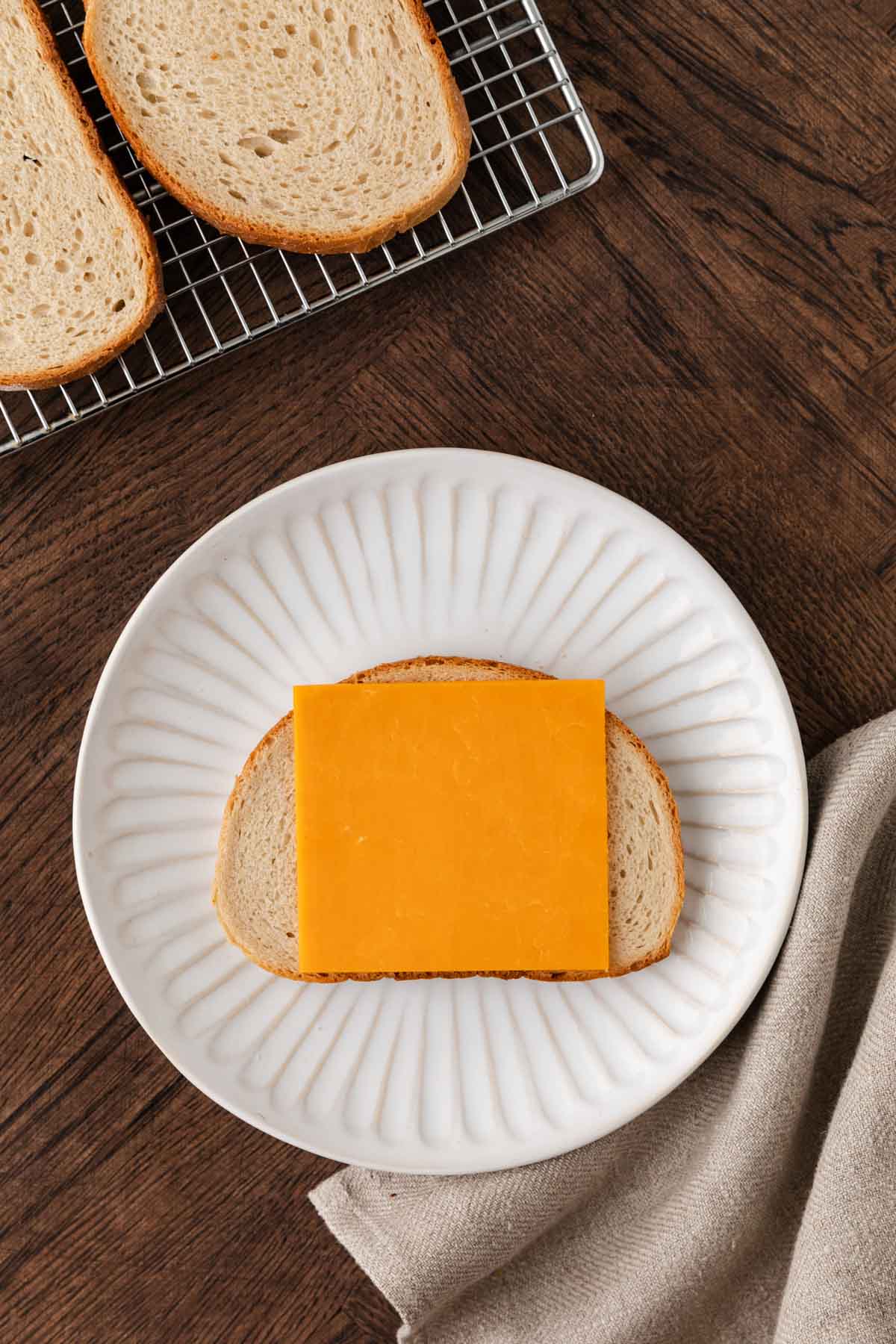 slice of cheese on white bread