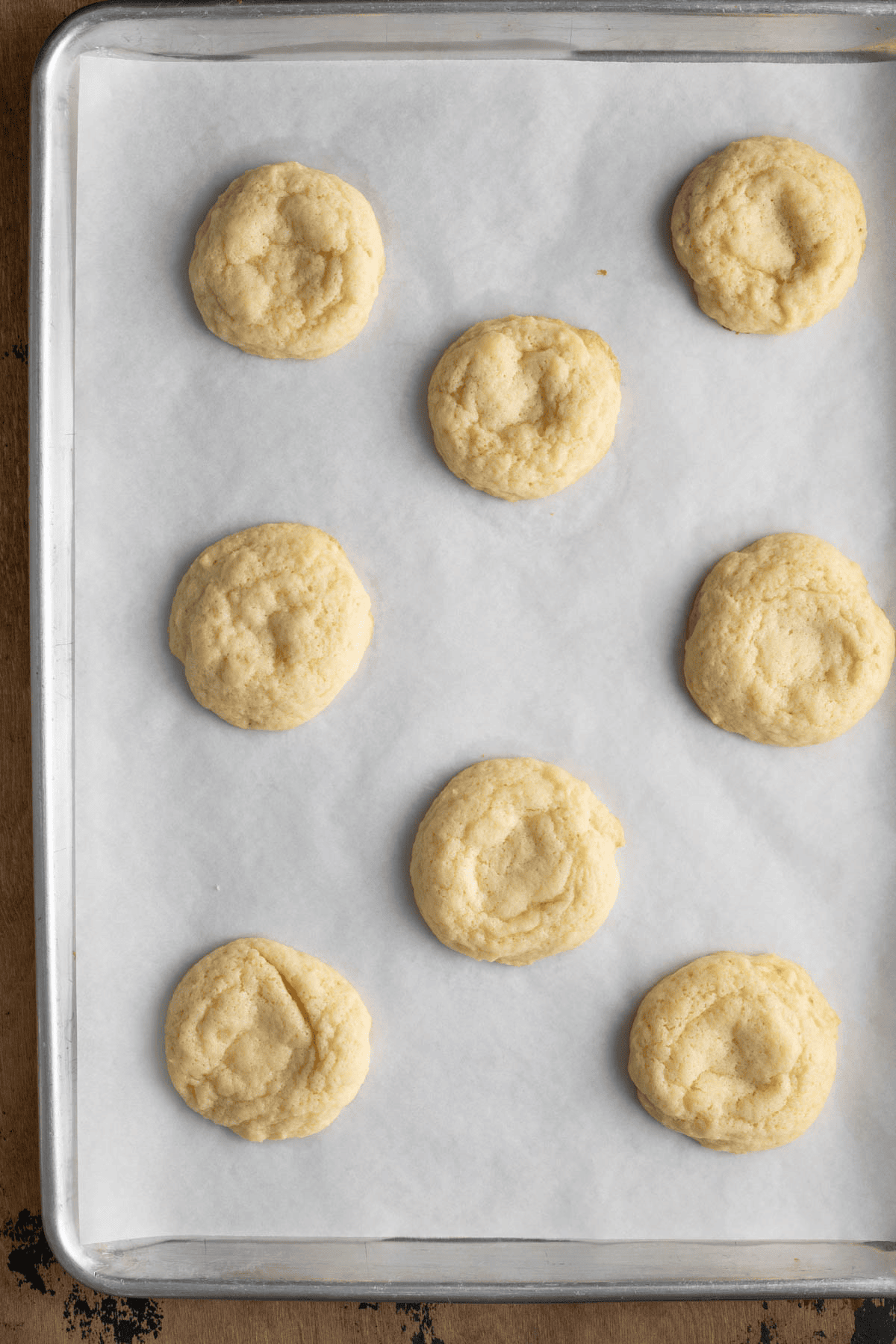 Baked cookies over parchment paper