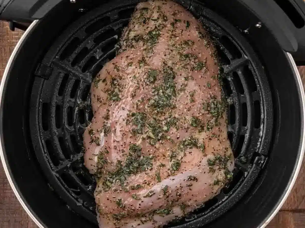 herb coated turkey breast uncooked in air fryer