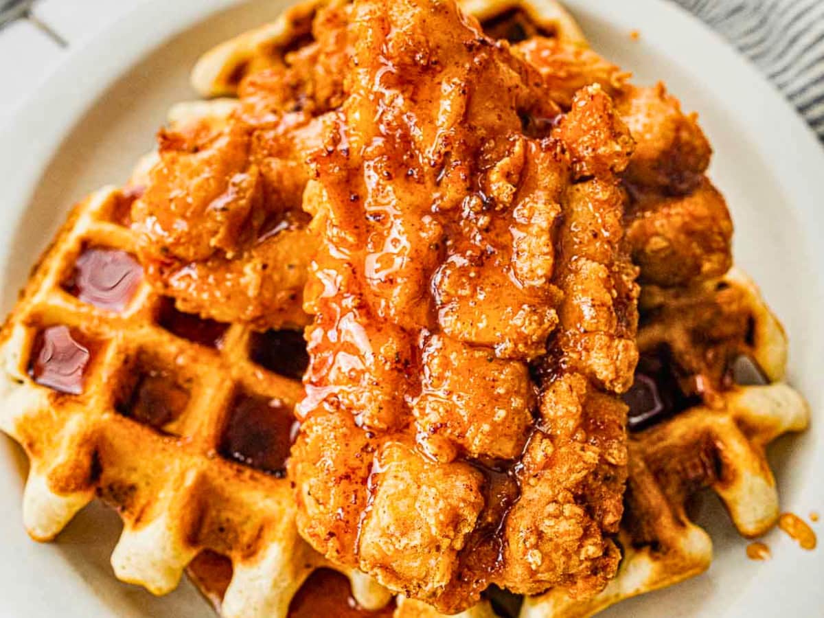 Chicken served over waffles with syrup