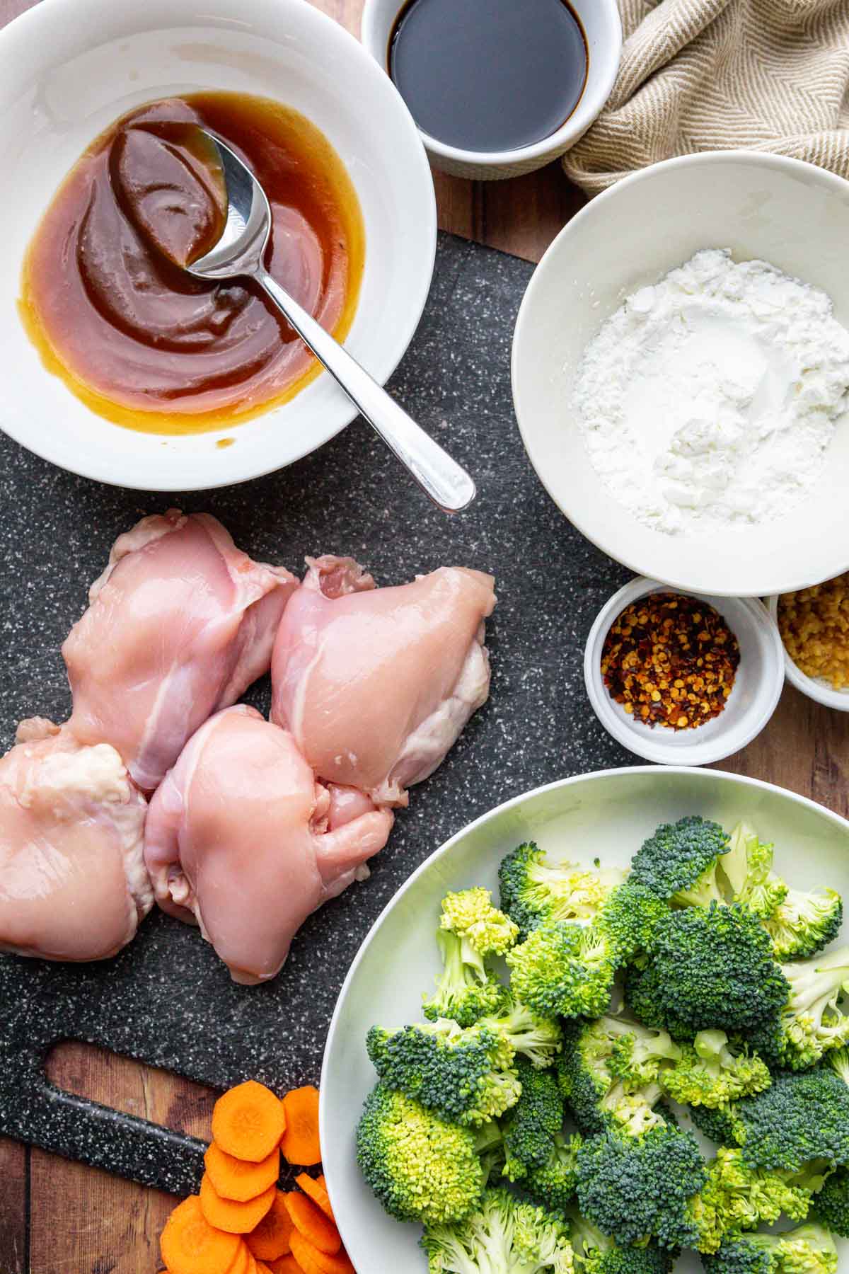 General Tso's Chicken Stir Fry ingredients spread out in separate prep bowls