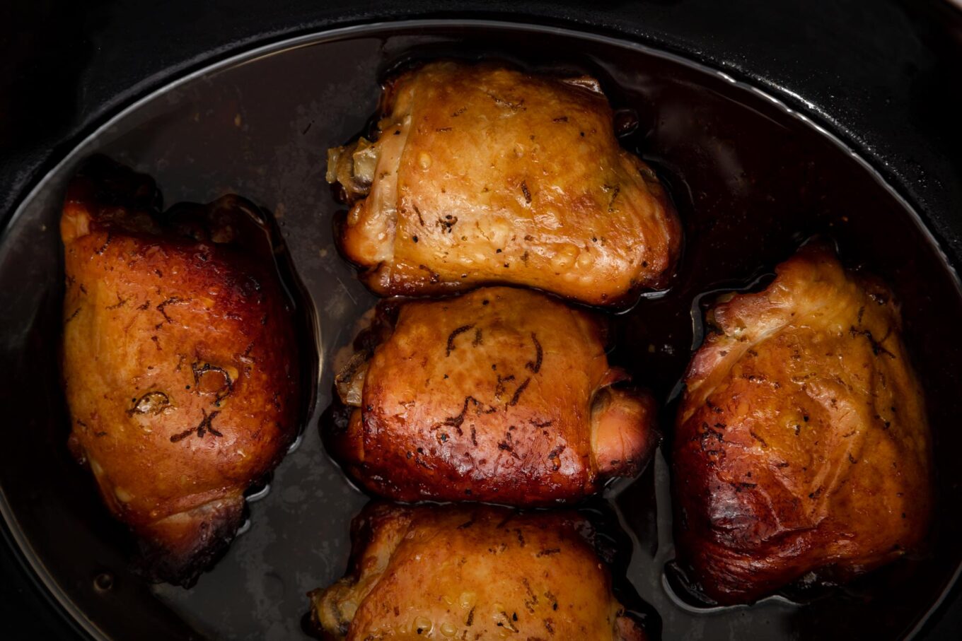 close up of thighs in crockpot 