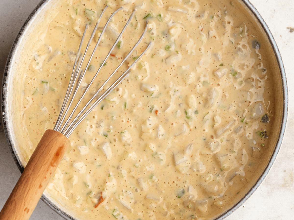 Mixed up seafood batter for frying in bowl.