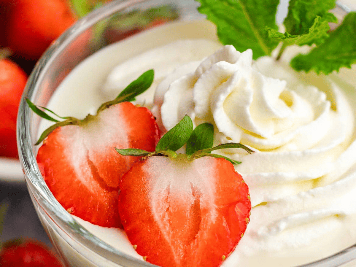 close up showing cream and strawberries