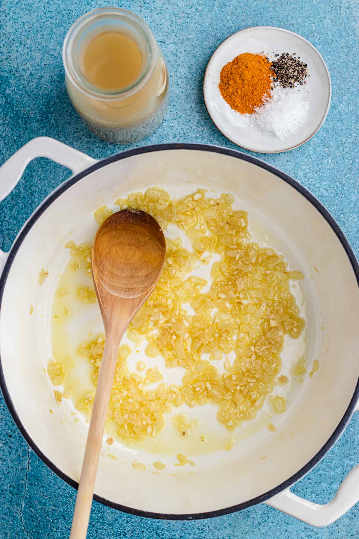 mixing ingredients in pot 