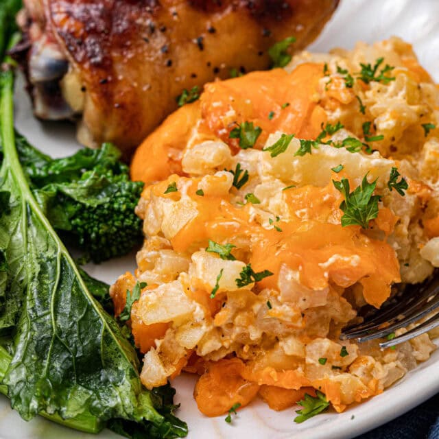 Dinner plate with chicken, veggies, and creamy potatoes.