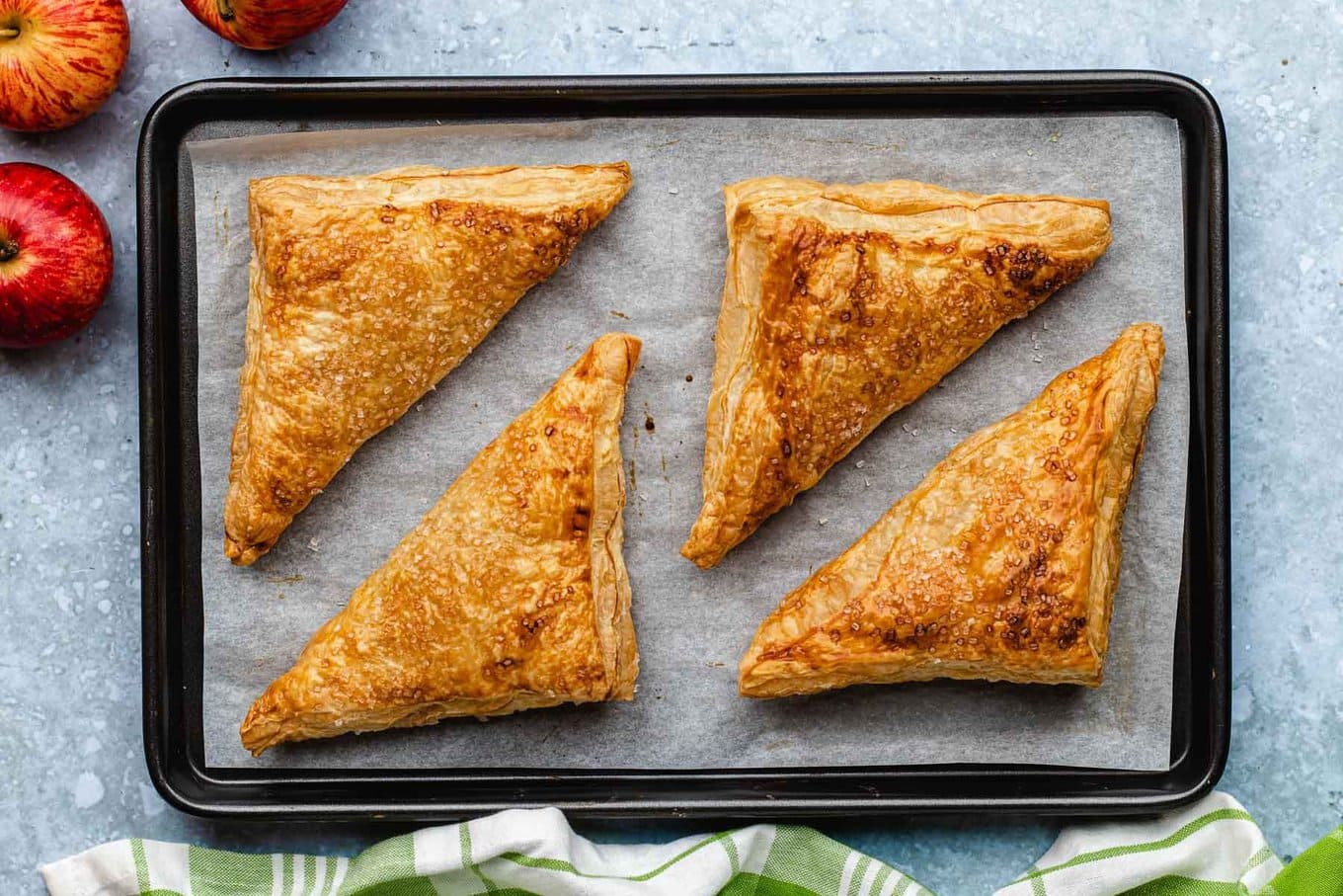 Apple Turnovers baked on baking sheet