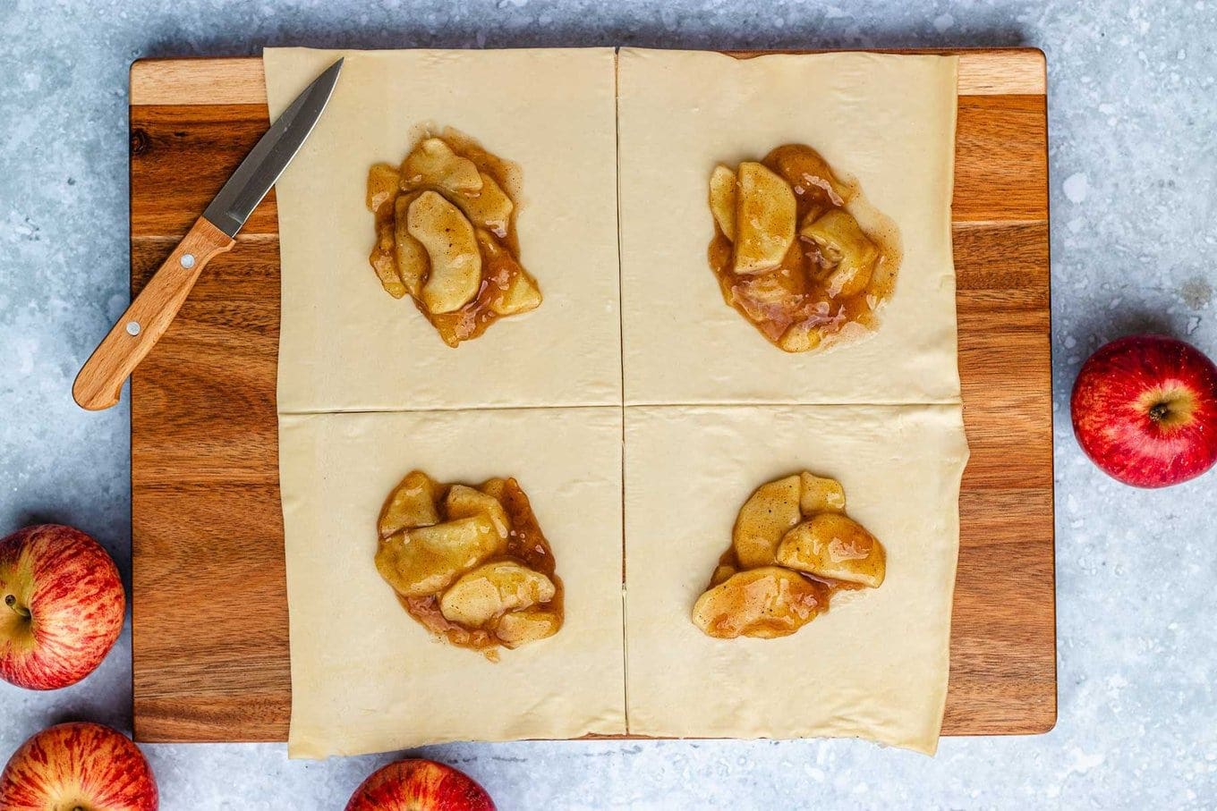 filling pastries on a wooden board 