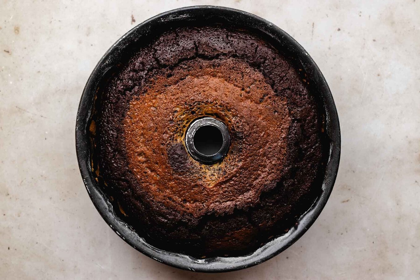 Chocoflan baked in Bundt pan before flipping, horizontal photo