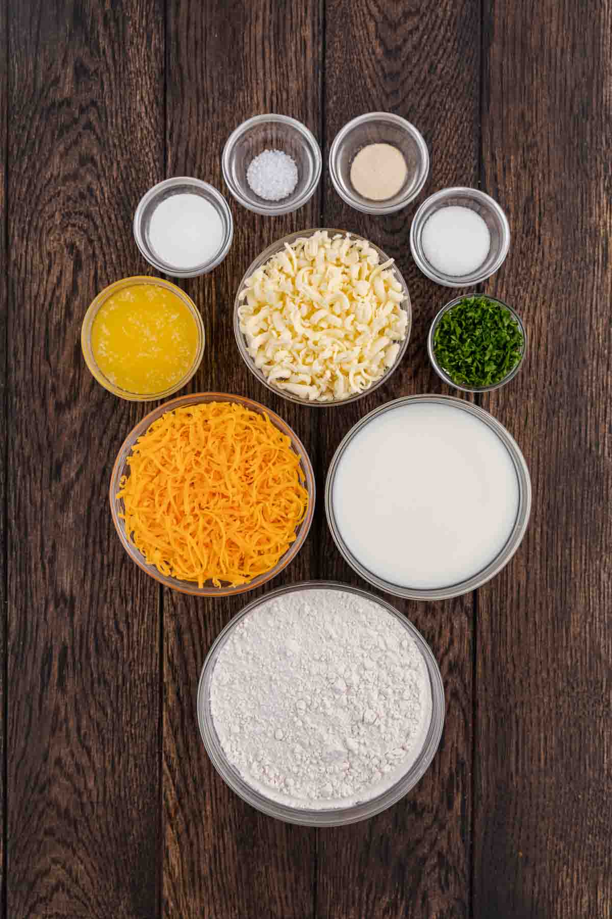 Garlic Cheddar Biscuits ingredients lined up in separate prep bowls