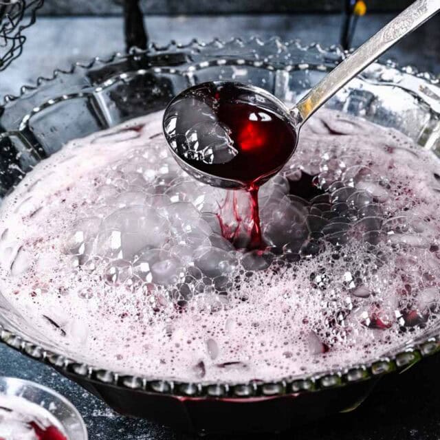 Punch in a bowl with ice and ladle.