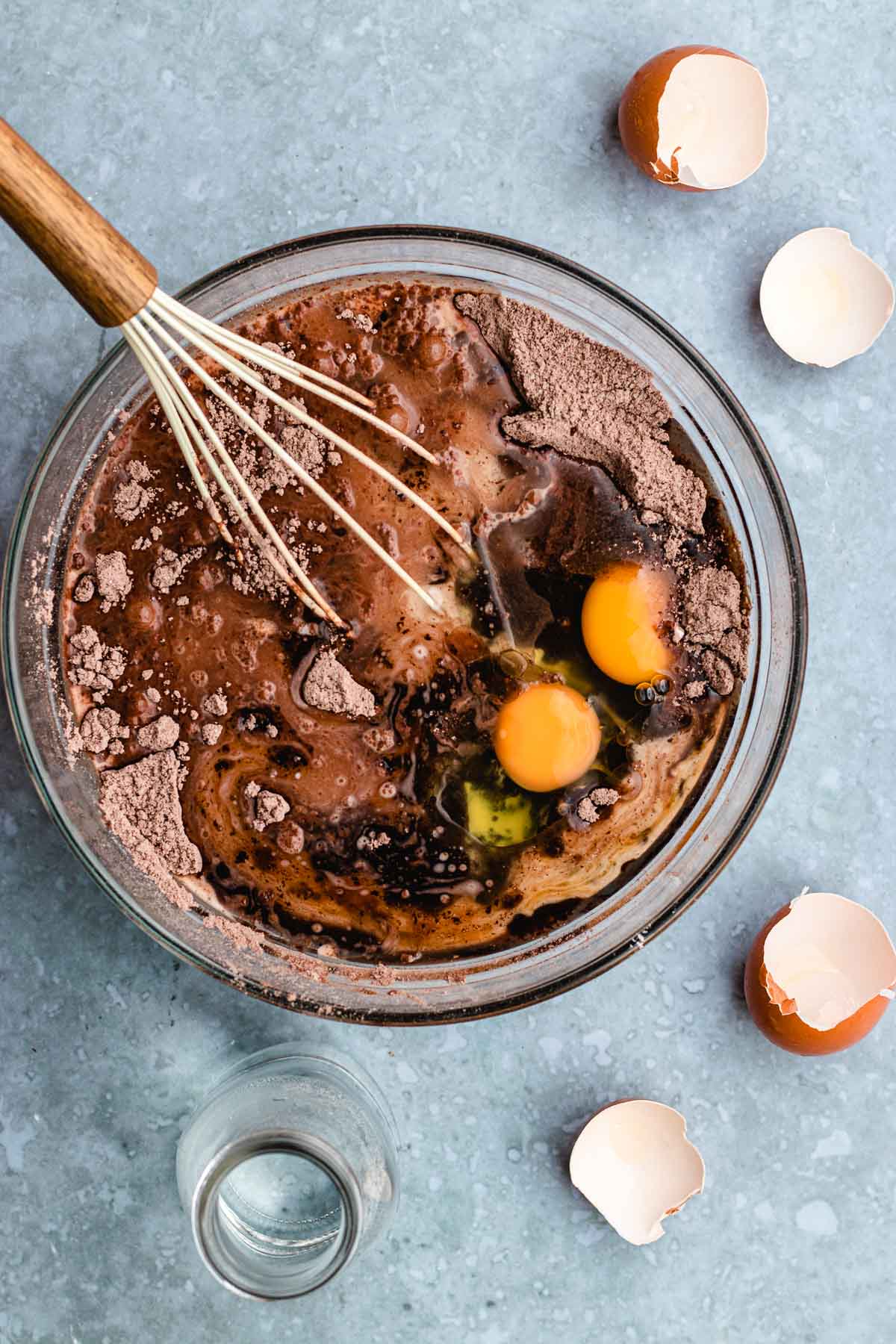 adding eggs to cake batter