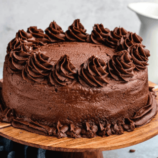cake on a wooden serving tray