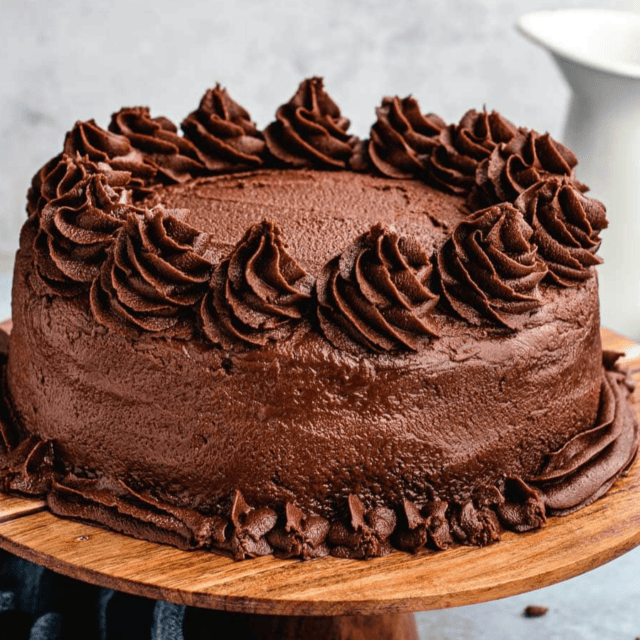 cake on a wooden serving tray