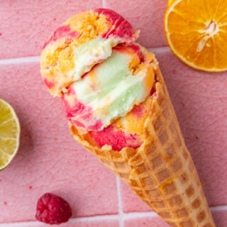 Raspberry Sherbet combined to make rainbow sherbet scooped in a waffle cone. 4x3