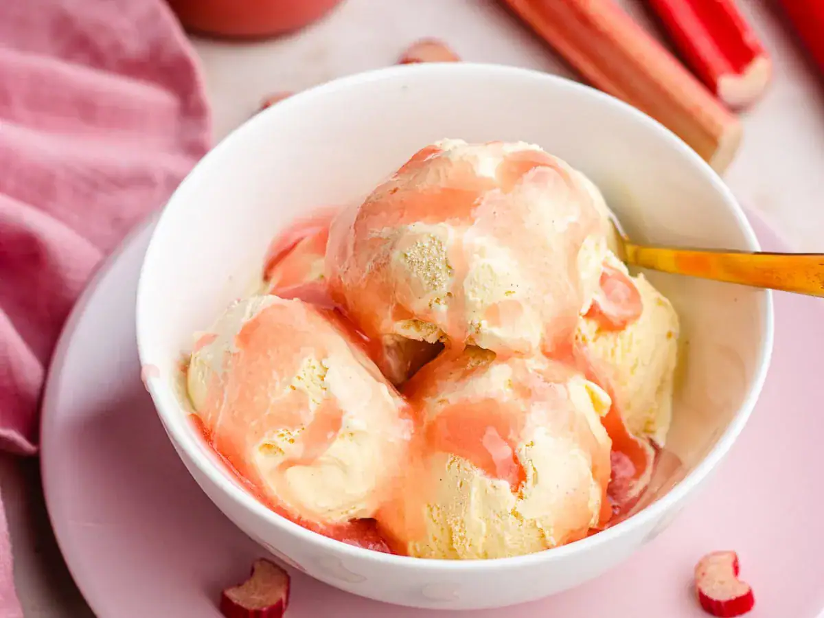 rhubarb sauce on ice cream in a bowl