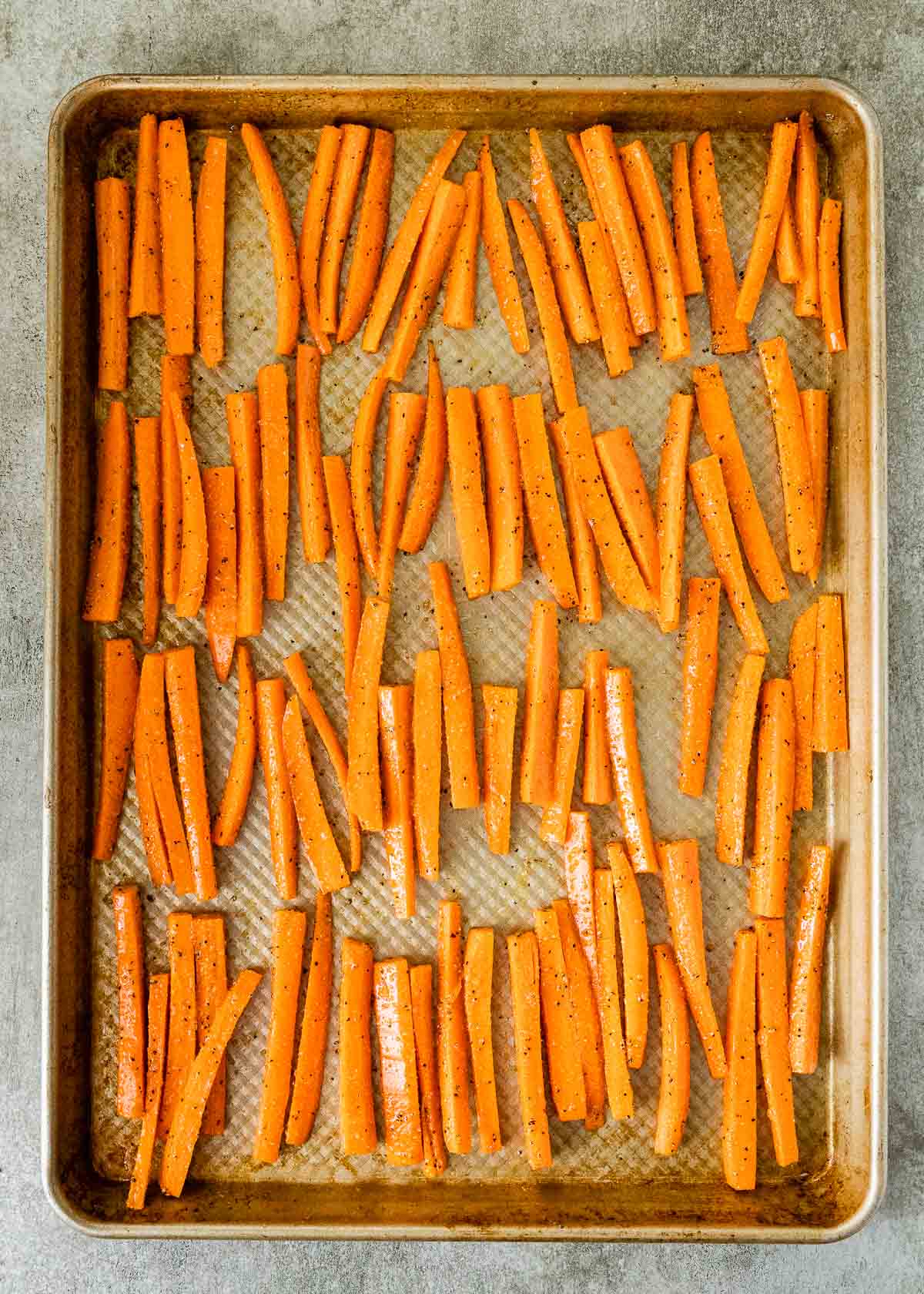 Roasted Carrot Fries, raw on the baking sheet