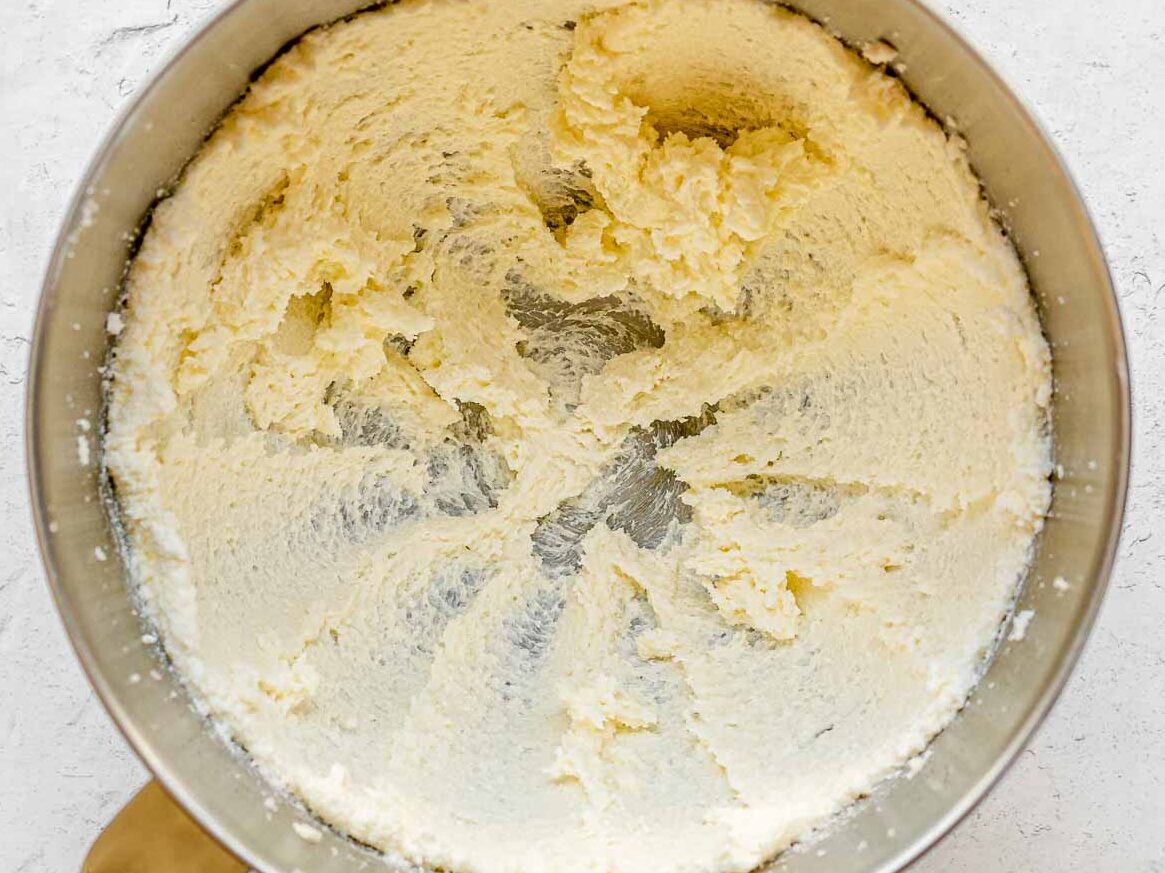Unicorn Cupcakes creamed butter and sugar in mixing bowl.