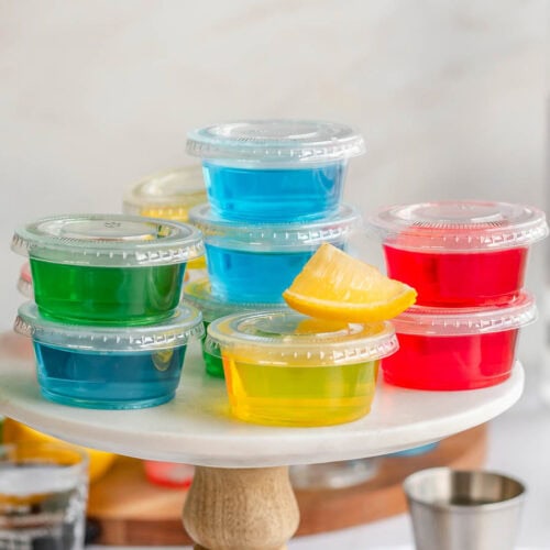 Jello Shots, stacked in cups with lids