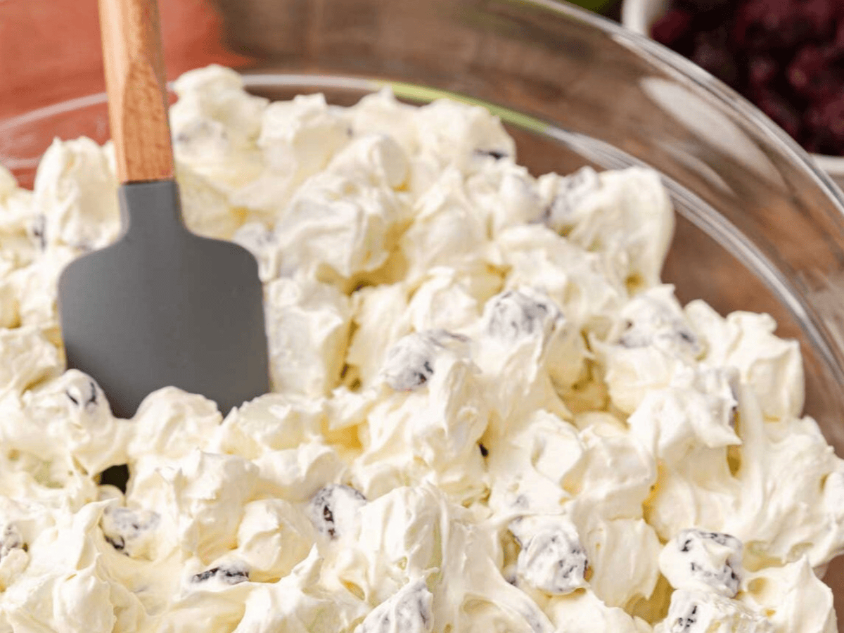 Salad in bowl with spatula