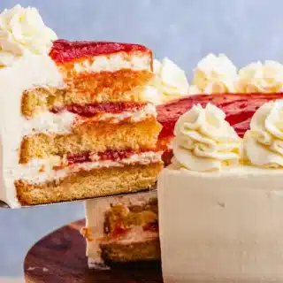 Layer cake with slice being taken out
