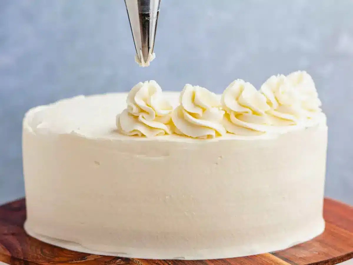 Frosting piped onto cake