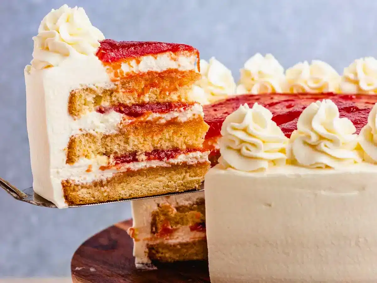 Layer cake with slice being taken out