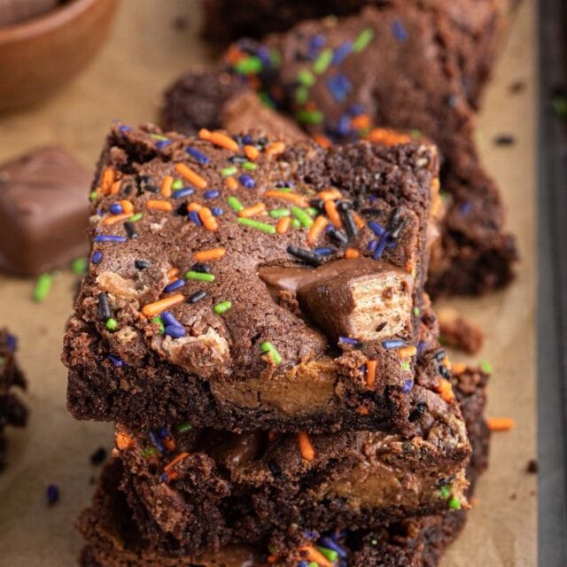 stacked brownie squares, side view.