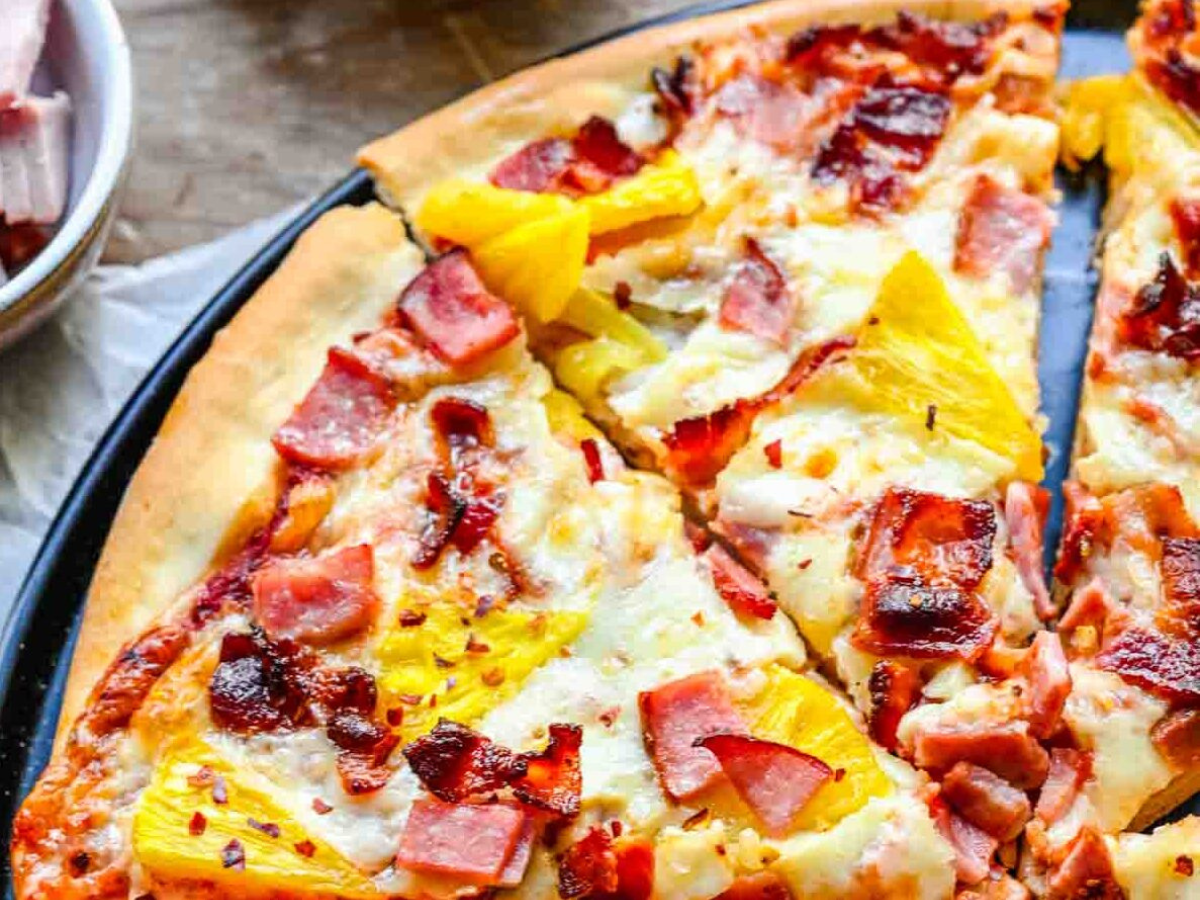 Closeup of pizza on pan
