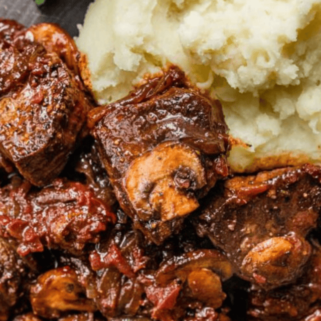 steak with potatoes on plate