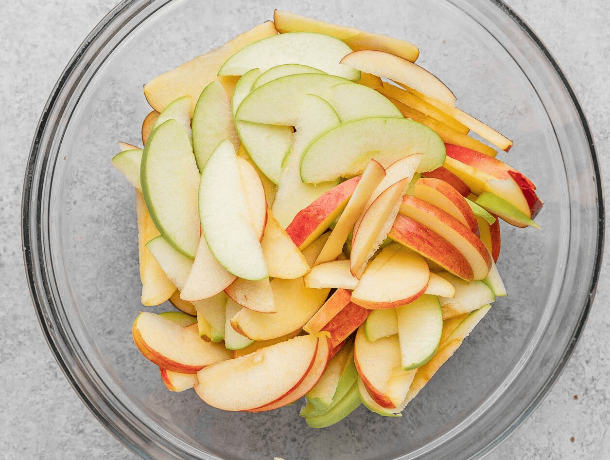 Sliced apples in a glass bowl