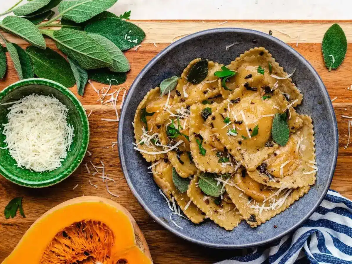 Ravioli in blue bowl on brown table