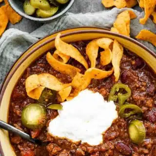 Chili in bowl with toppings