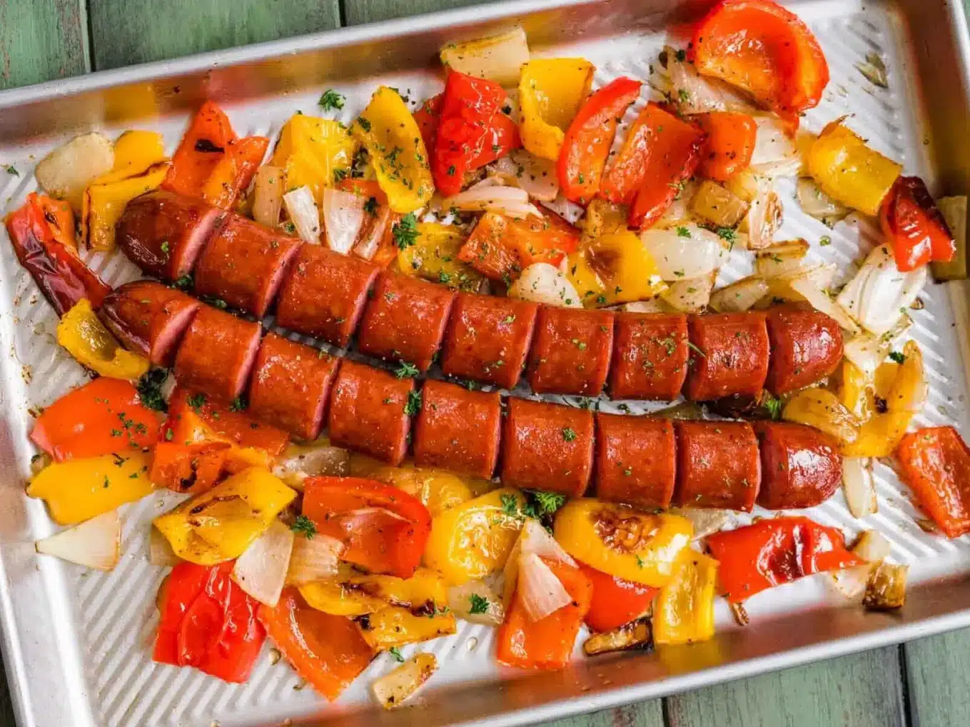 kielbasa on sheet tray with veggies