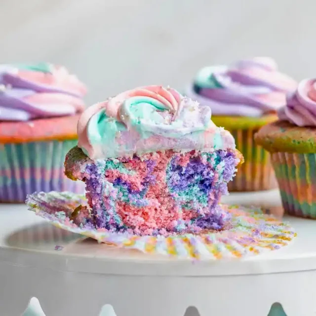 Multicolored cupcake cut in half