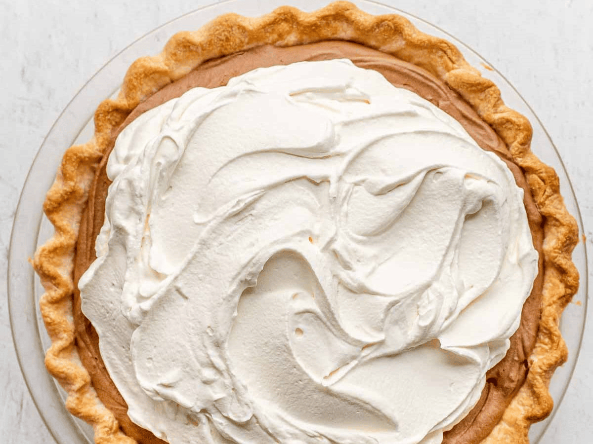 Chocolate pie topped with whipped cream