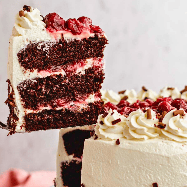 slice of cake taken out of full cake