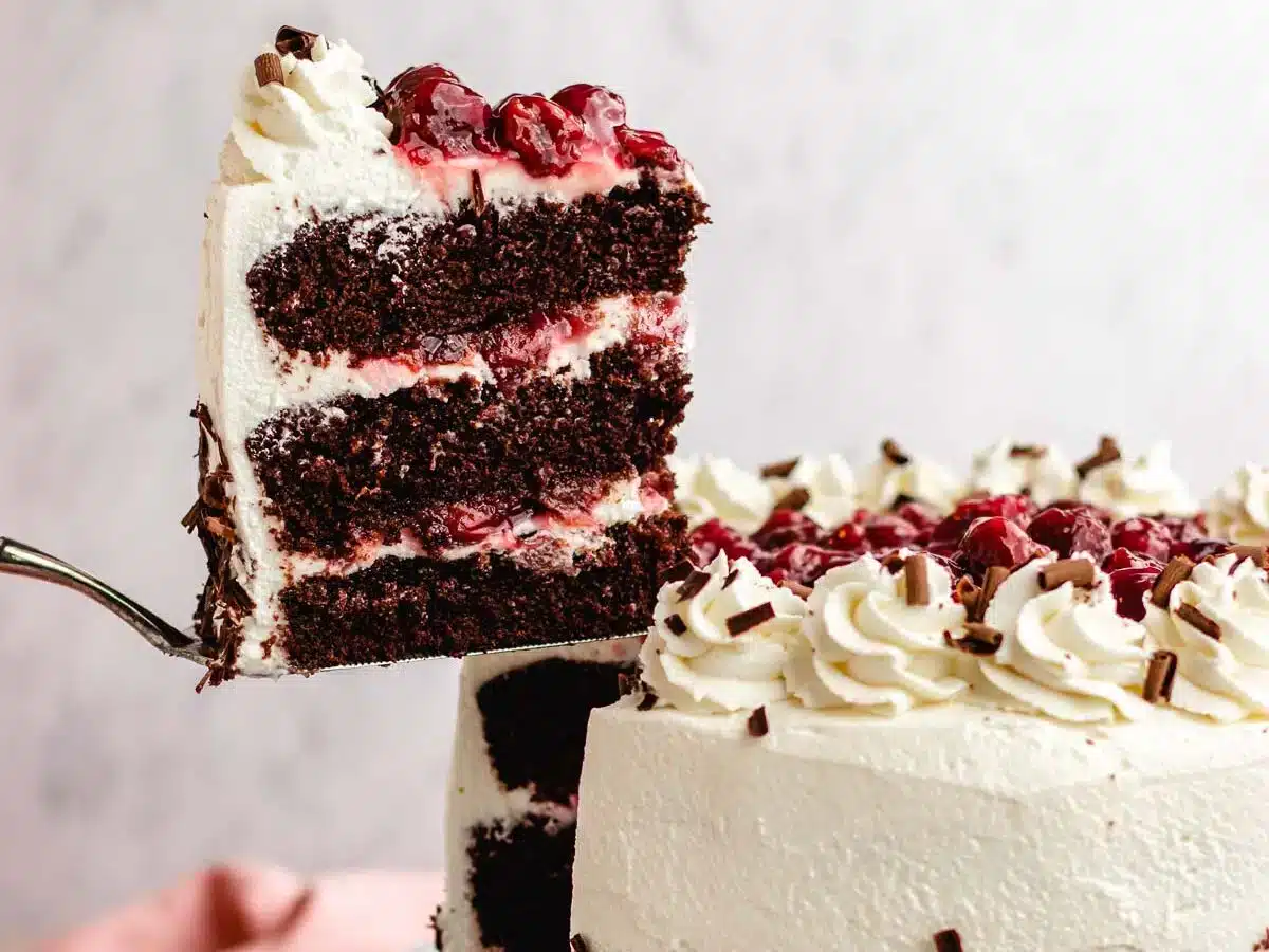 removing piece of cake from whole cake