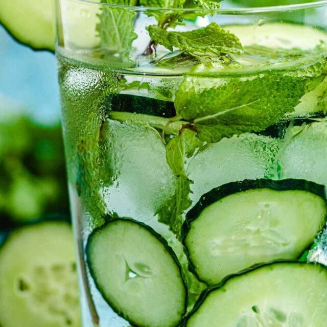 Glass of water with cucumber slices