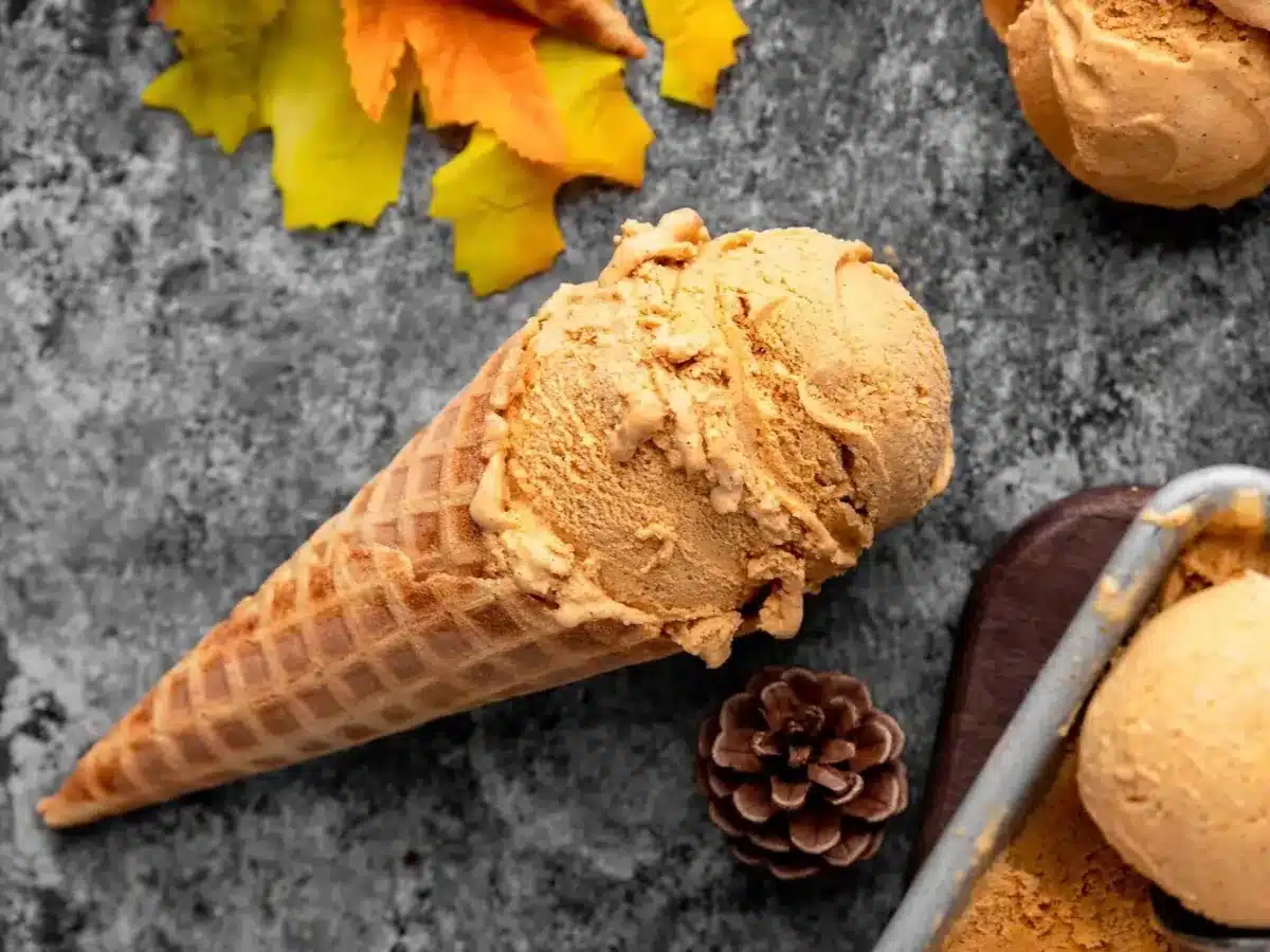 Cone with ice cream laying on its side