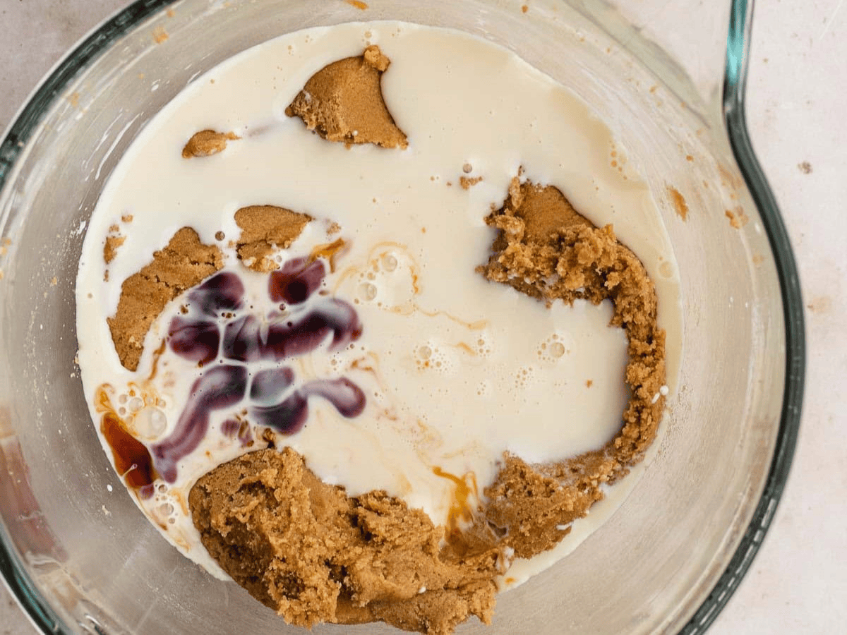 Brown sugar, milk, and vanilla in a bowl
