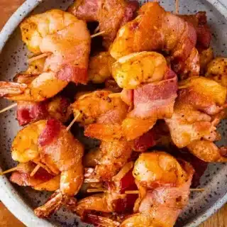 Shrimp wrapped with bacon in bowl