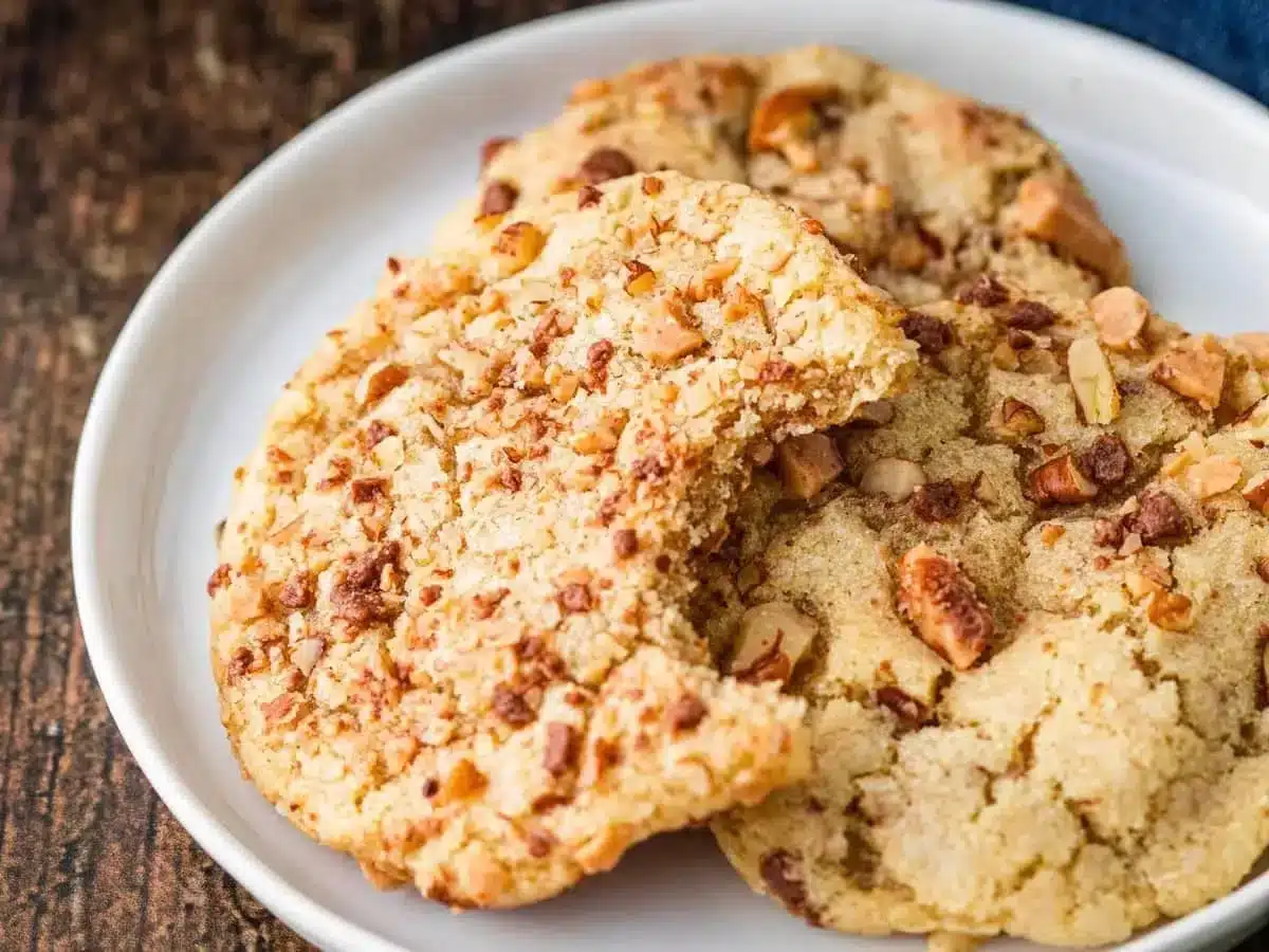 Baked goods on a plate with bite taken out