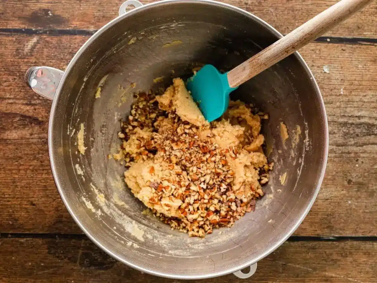 Ingredients in a mixing bowl with spatula