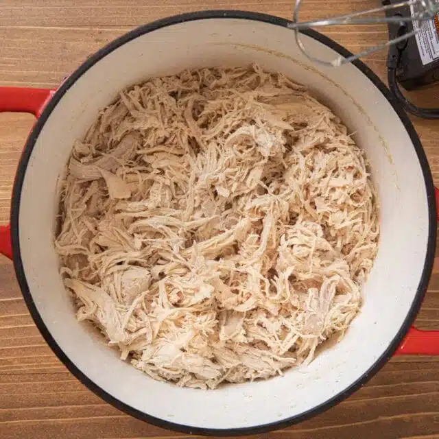 Easy Shredded Chicken in pot with electric mixer