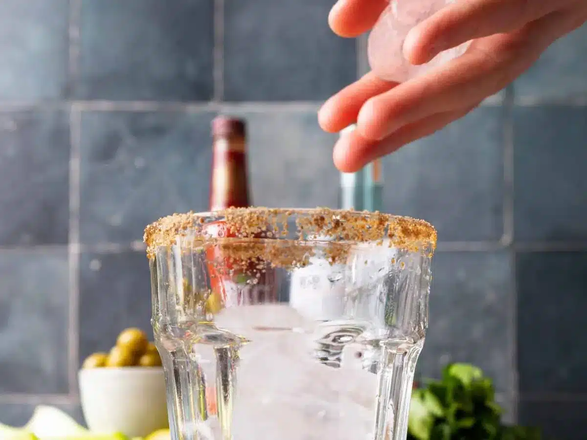 Salt rimmed glass with ice being added.