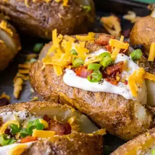 Potatoes loaded with cheese, bacon, and sour cream.
