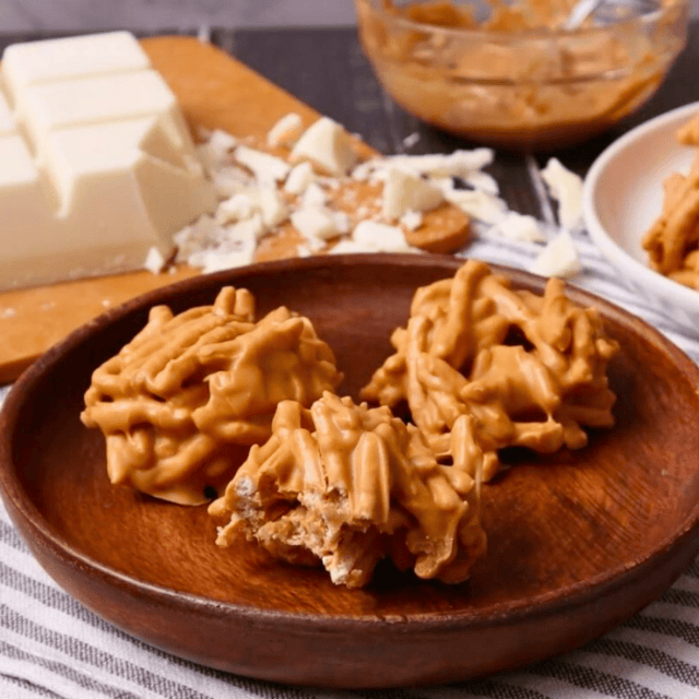 tan colored sweet treat on a wood plate