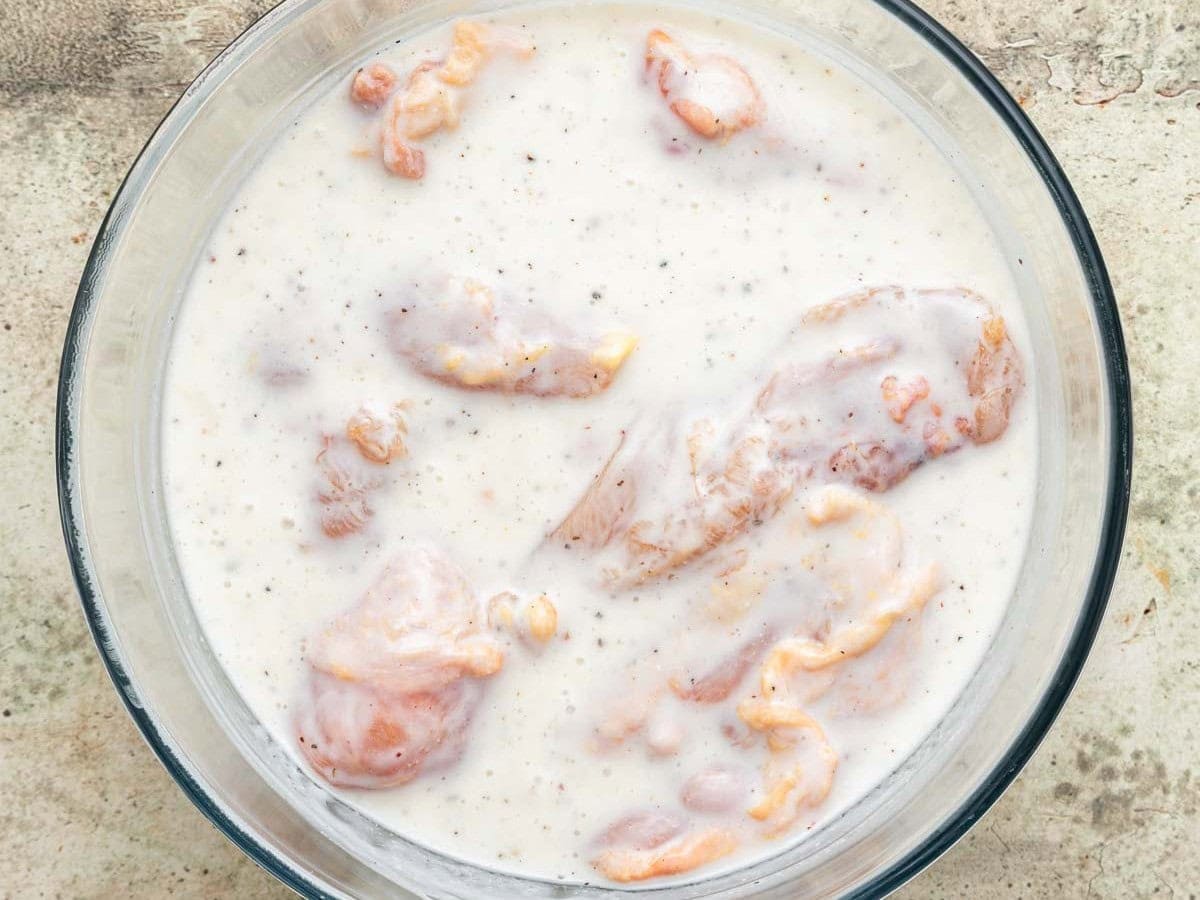 chicken soaking in buttermilk